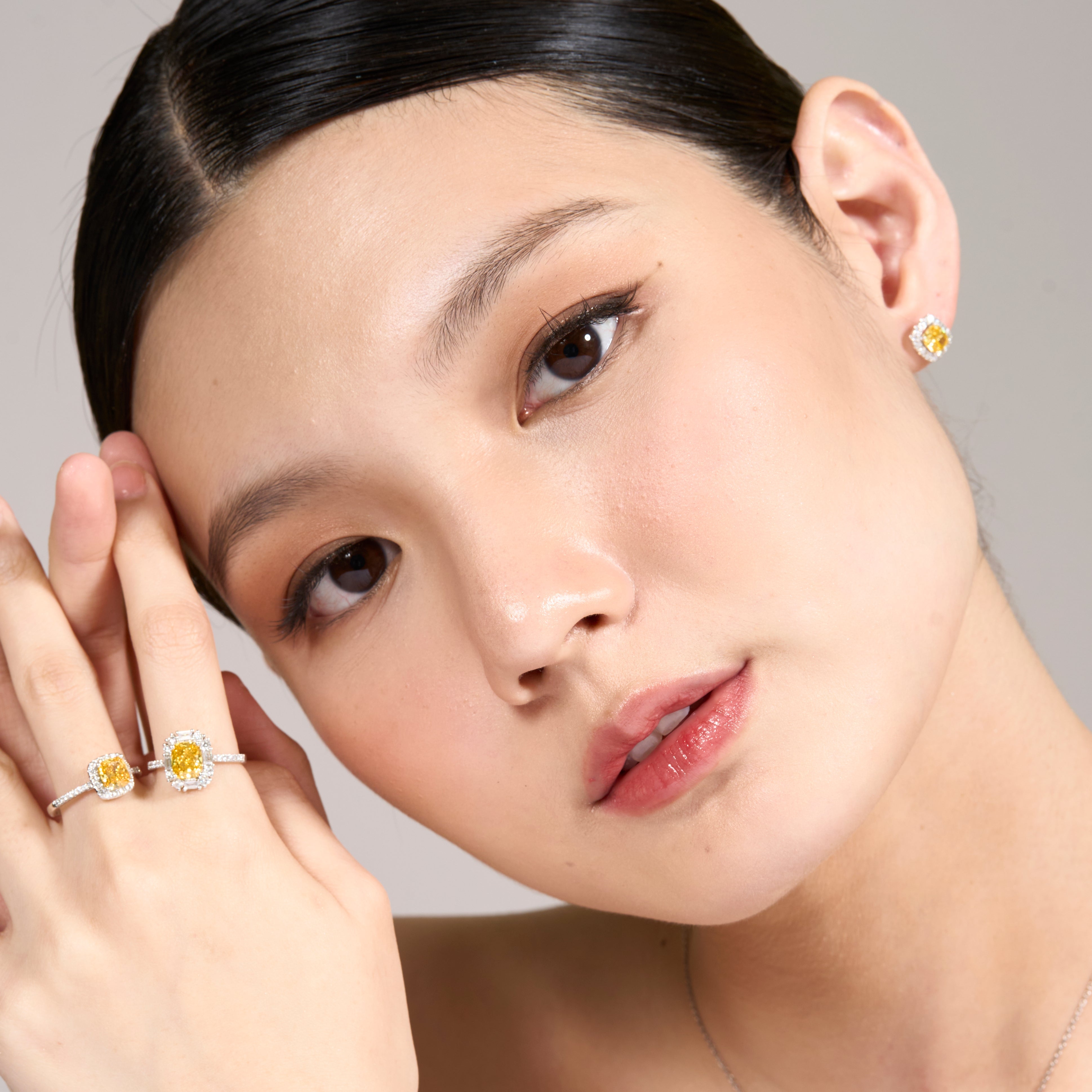 Fancy Vivid Yellow Diamond Stud Earrings