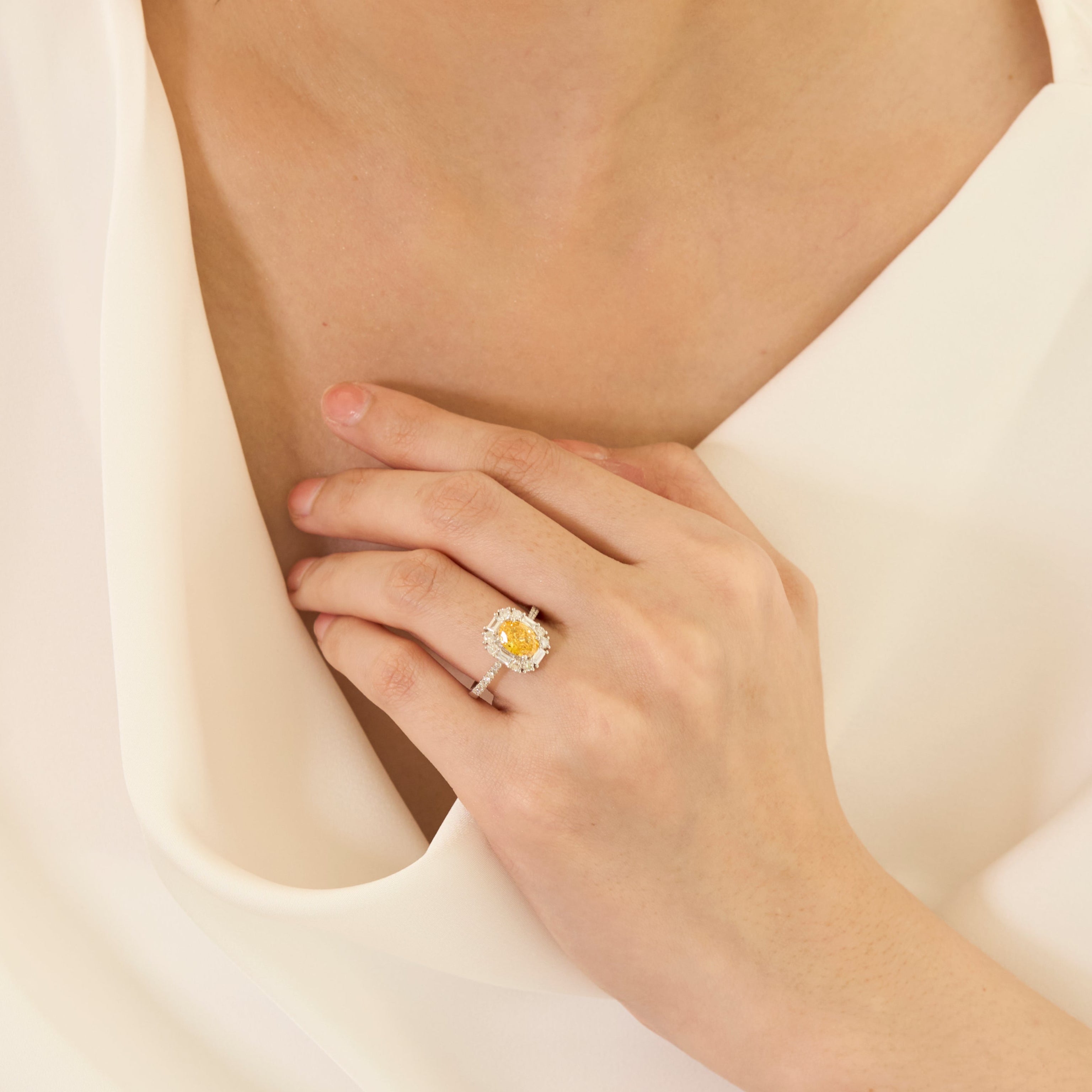 Oval Fancy Vivid Yellow Diamond Ring - Signature Baguette Halo