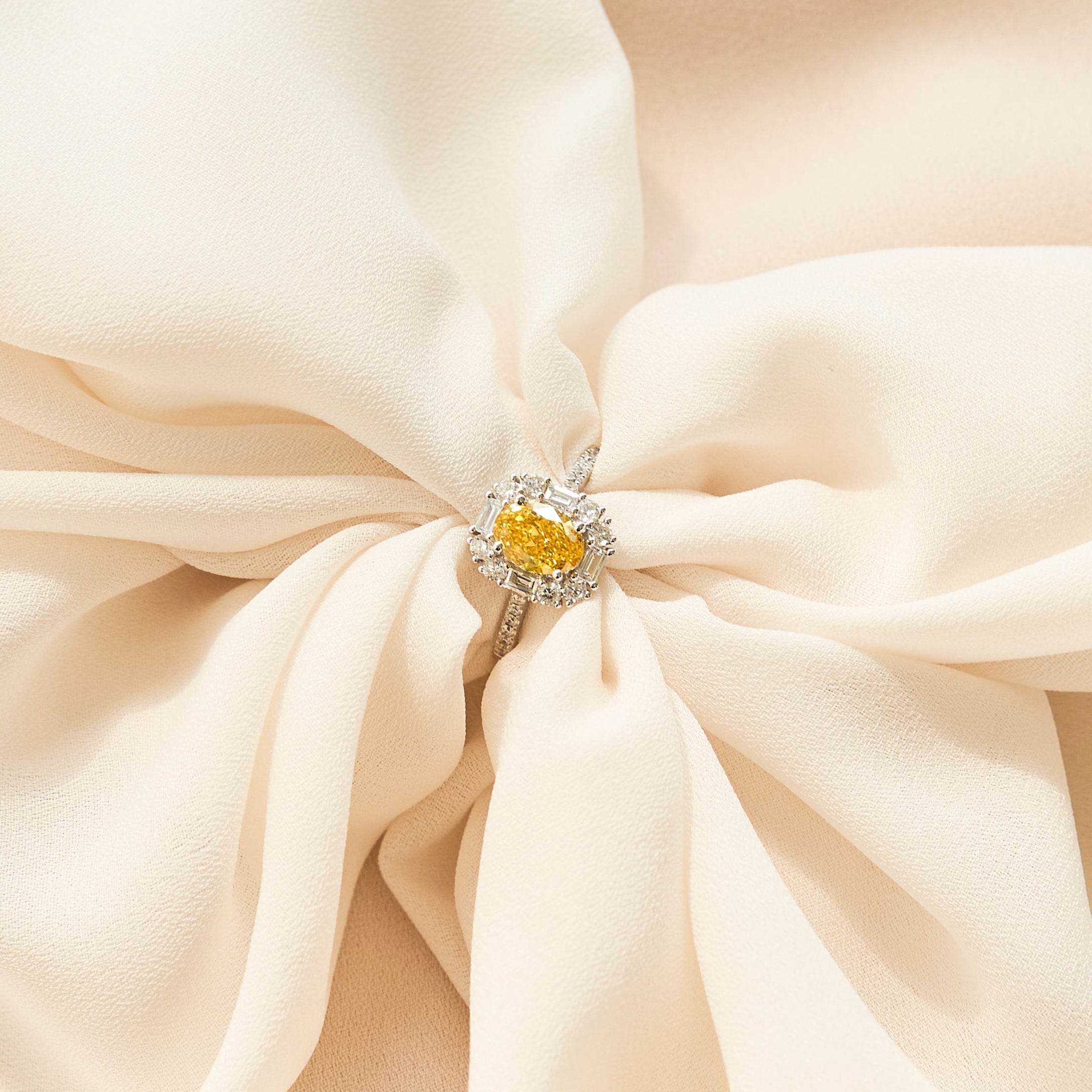 Oval Fancy Vivid Yellow Diamond Ring - Signature Baguette Halo